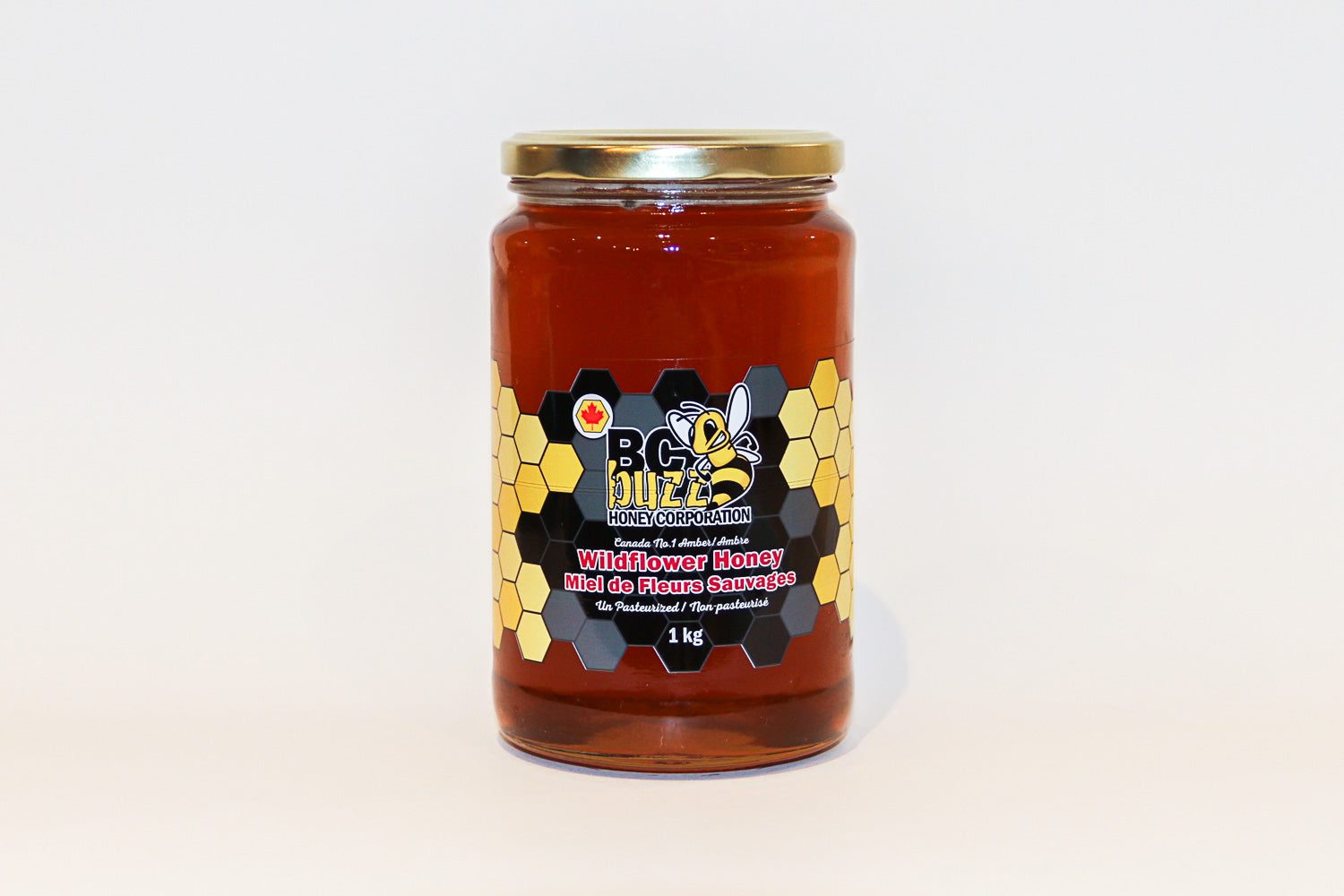 A 1 kg jar of BC Buzz wildflower honey