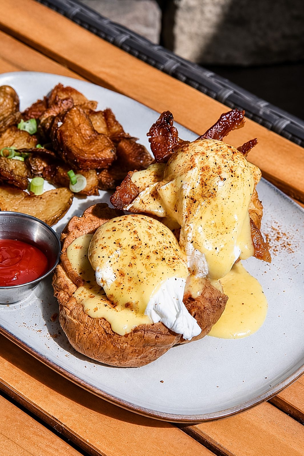 The Yorkshire Benny: poached eggs and hollandaise in a Yorkshire pudding with bacon and crispy potatoes