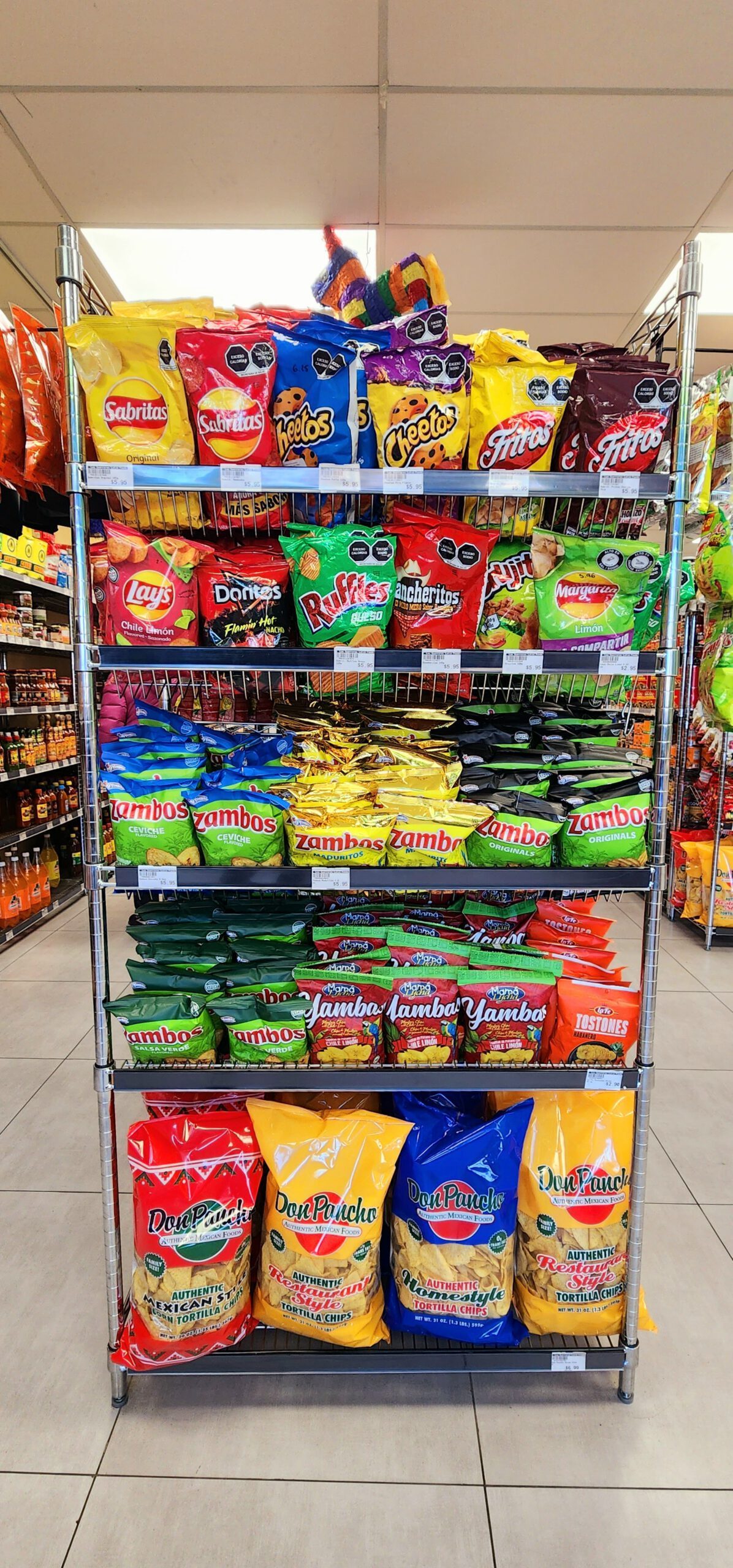 A rack of imported Mexican snack bags and chips at Los Guerreros