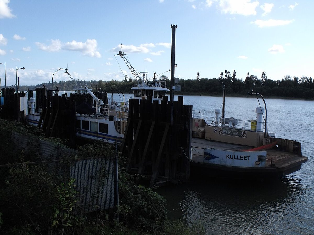 The retired Albion ferries, with Kulleet in front, tied up at a dock on the Fraser River in October 2010