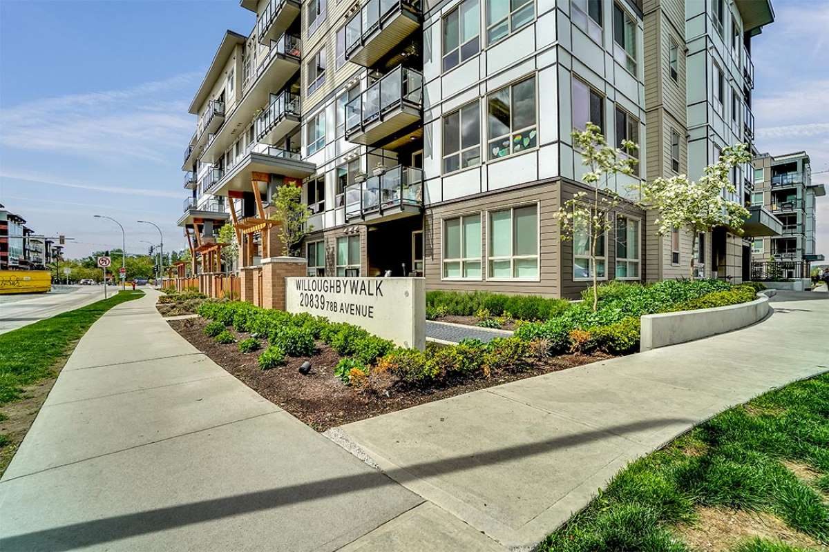 The Willoughby Walk rental apartment building at 20839 78B Avenue, with its sign and landscaped sidewalk