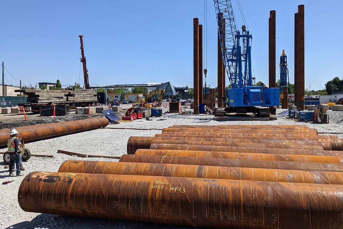 Steel piles and a pile-driving rig at the Langley City Centre SkyTrain station site