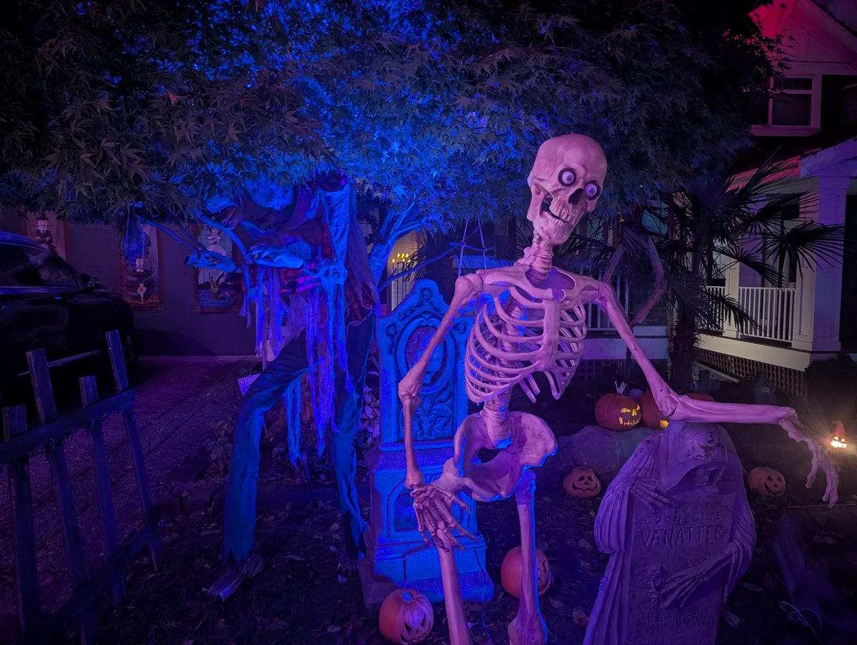 A grinning skeleton among the headstones