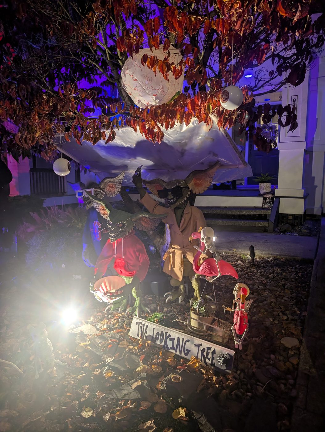 A spooky tree and its cast of characters
