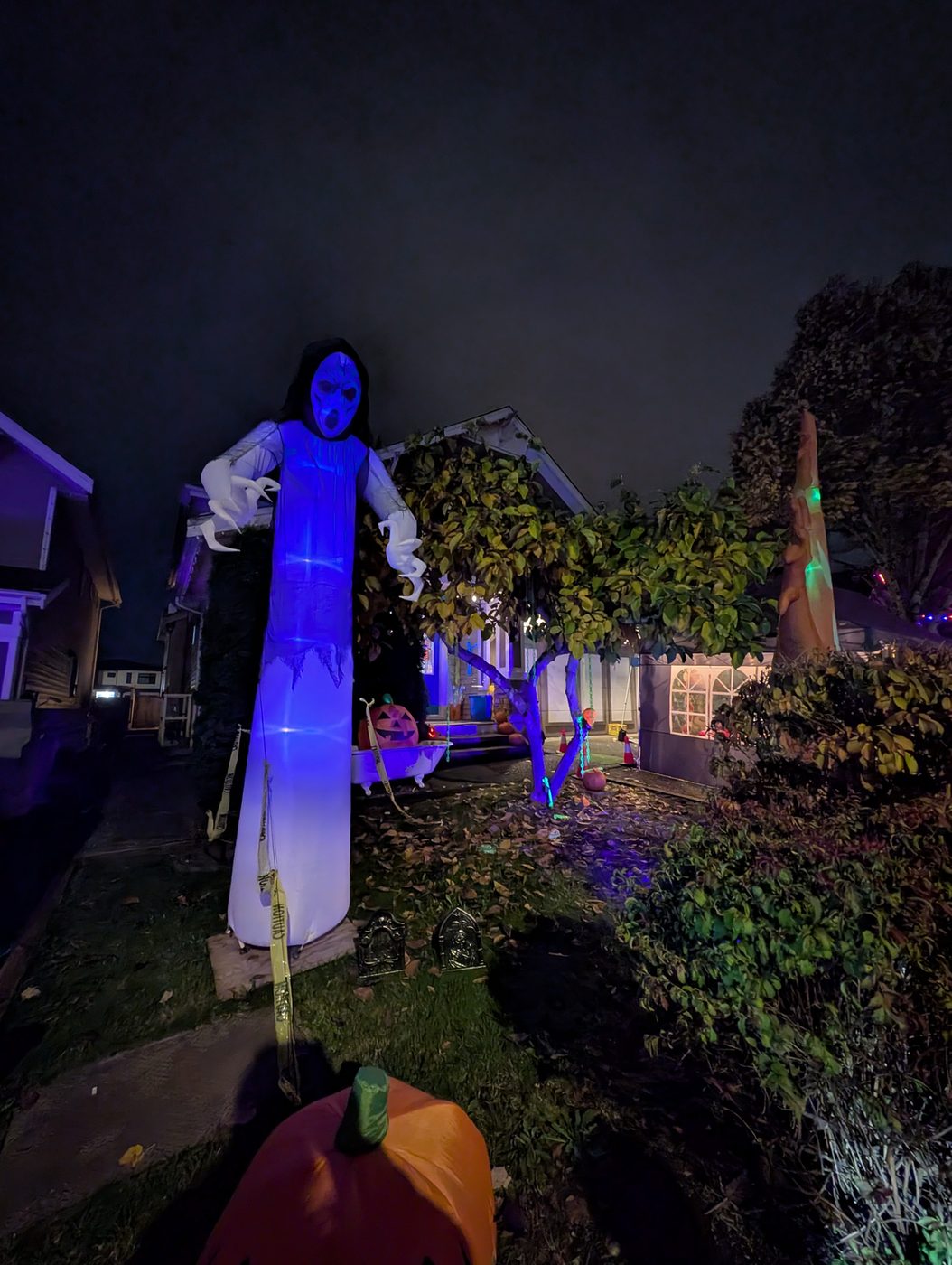 A tall ghost in blue light